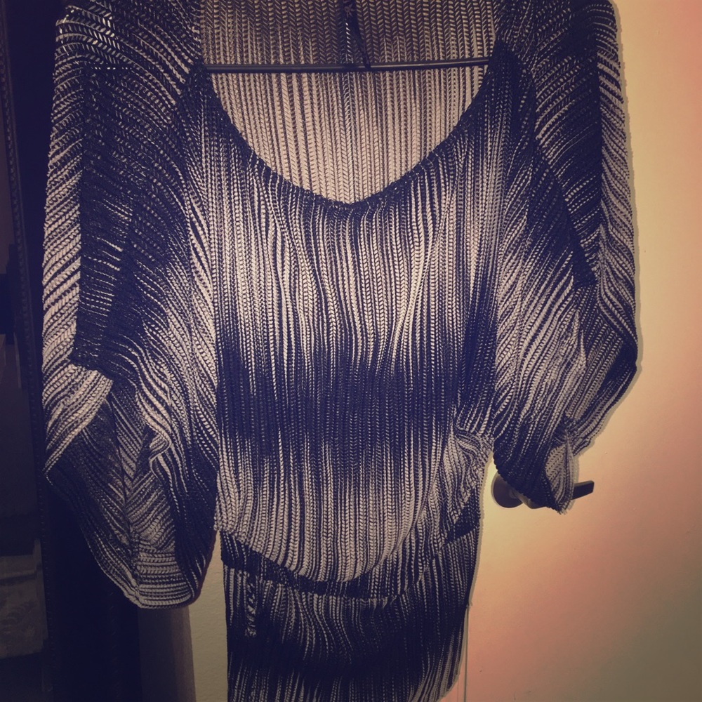 Loose/ fitted waist top